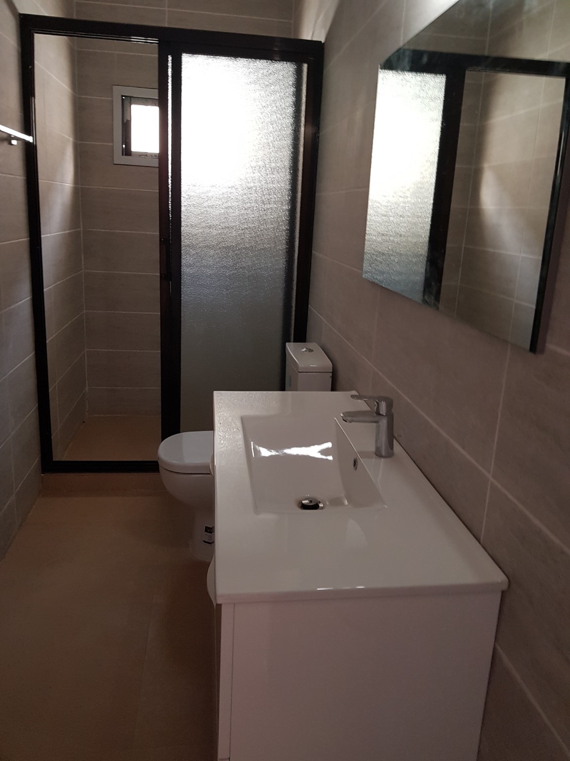 Bathroom fittings in the completed bungalow